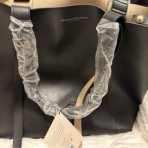 Donna Karan black tote. Made of PVC. Expandable.